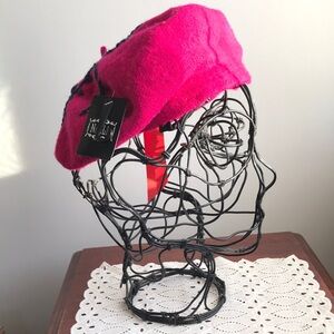 New! Raspberry Beret with navy blue embroidery One size New with tags! 80% Wool
